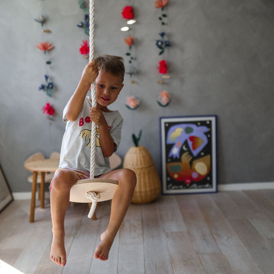 Wooden and rope swing ring