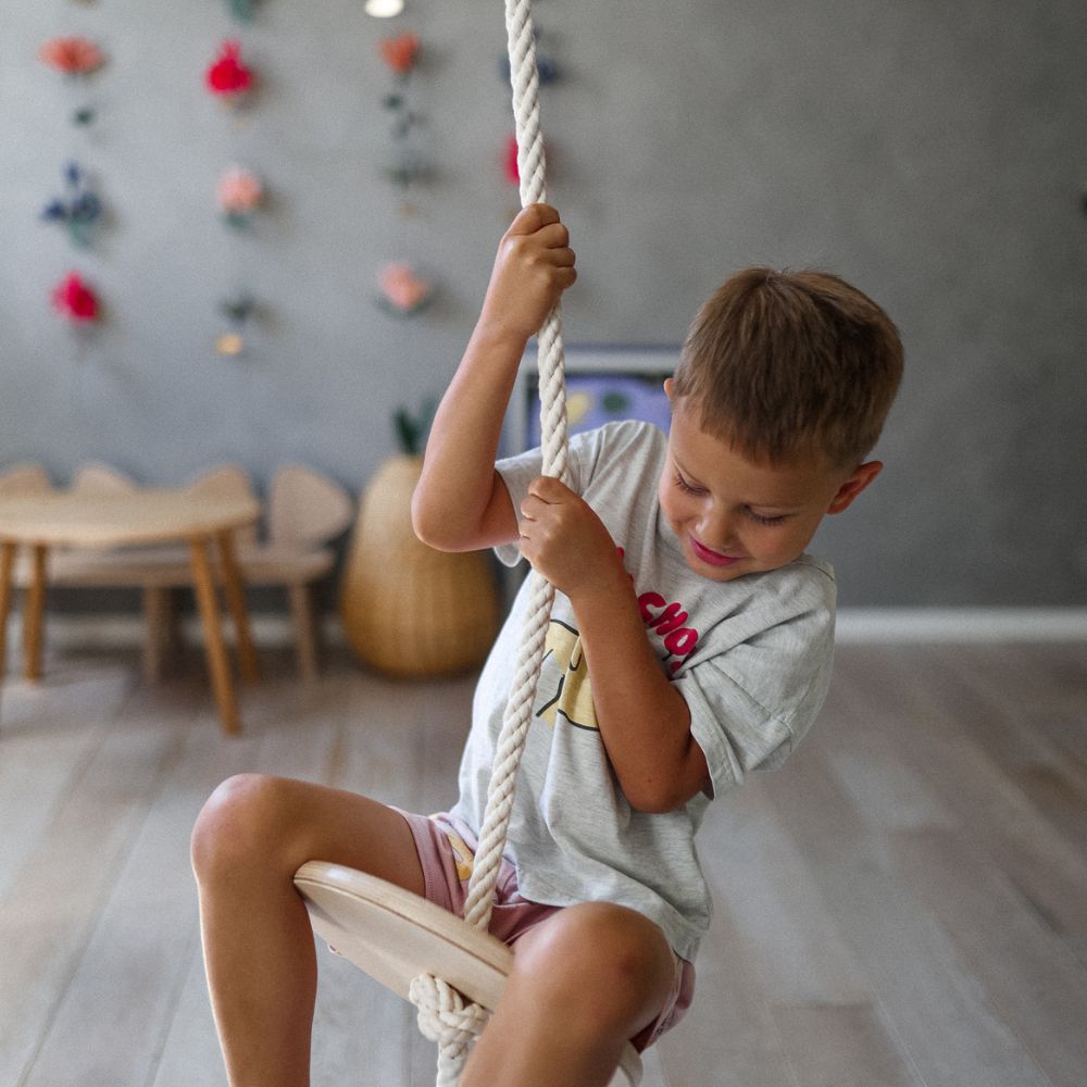 Wooden and rope swing ring