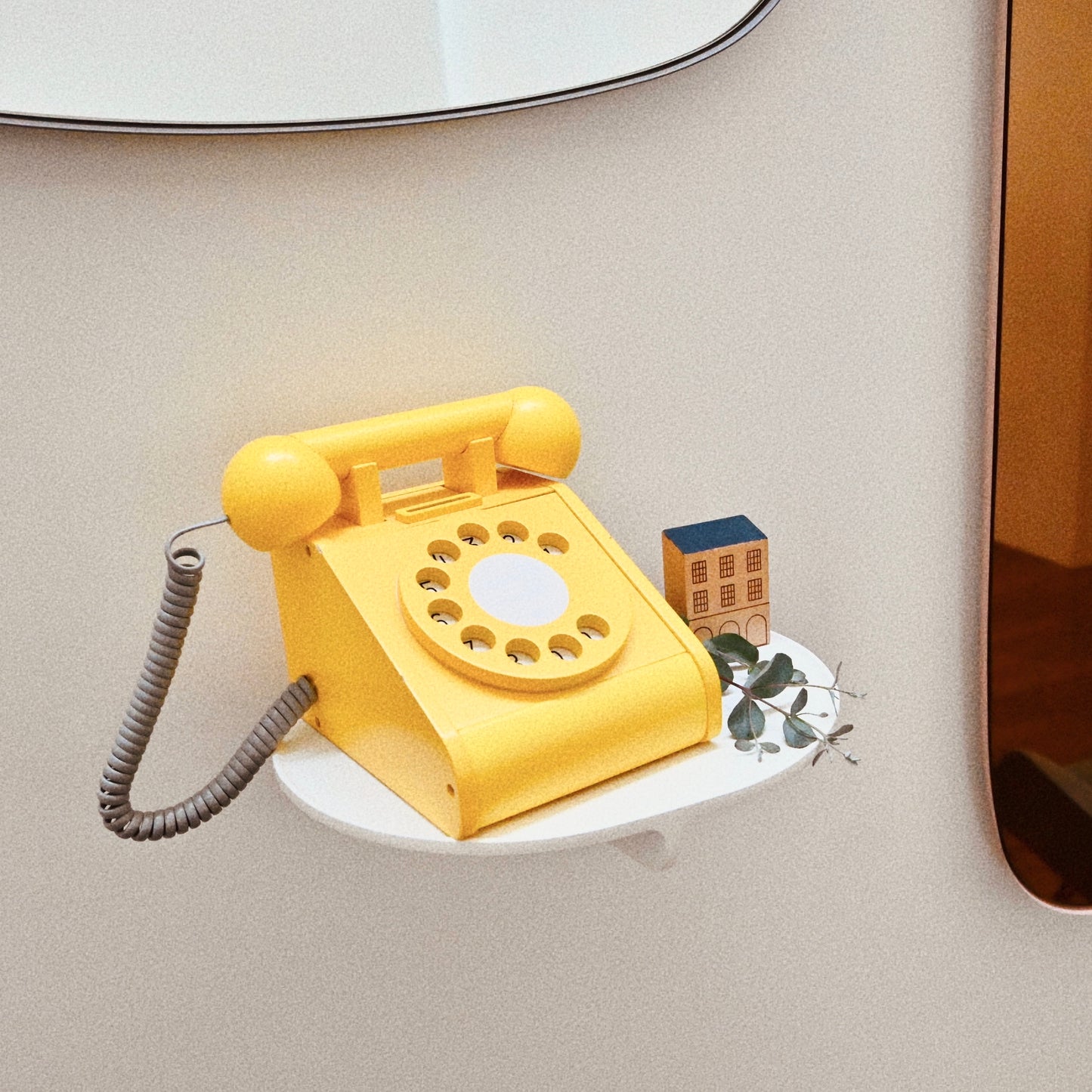 Wooden kids play telephone with coins - Yellow