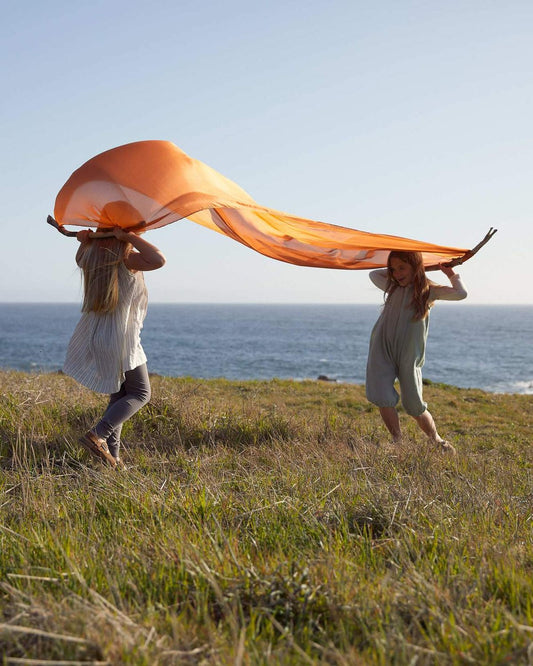 The Magic of Waldorf Play Silks: Why Every Child Needs One (or a Few)