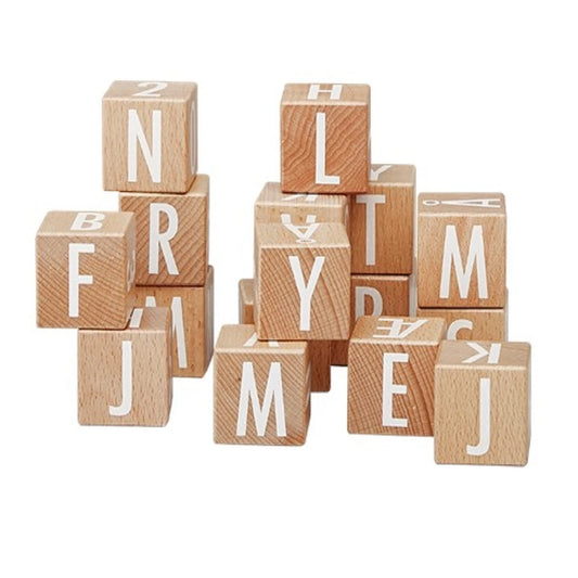 Wooden blocks stacking tower with letters