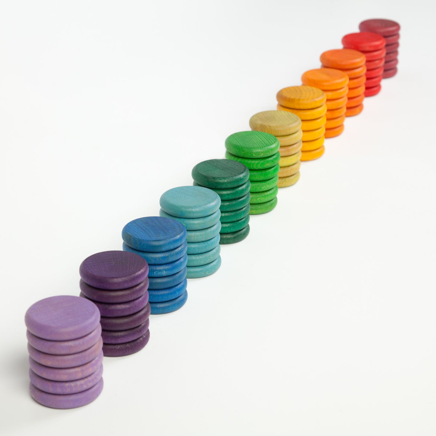 Set of 72 coloured wooden coins