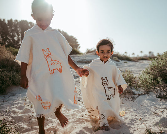 Handprinted cotton kids beach poncho-Ilama orange