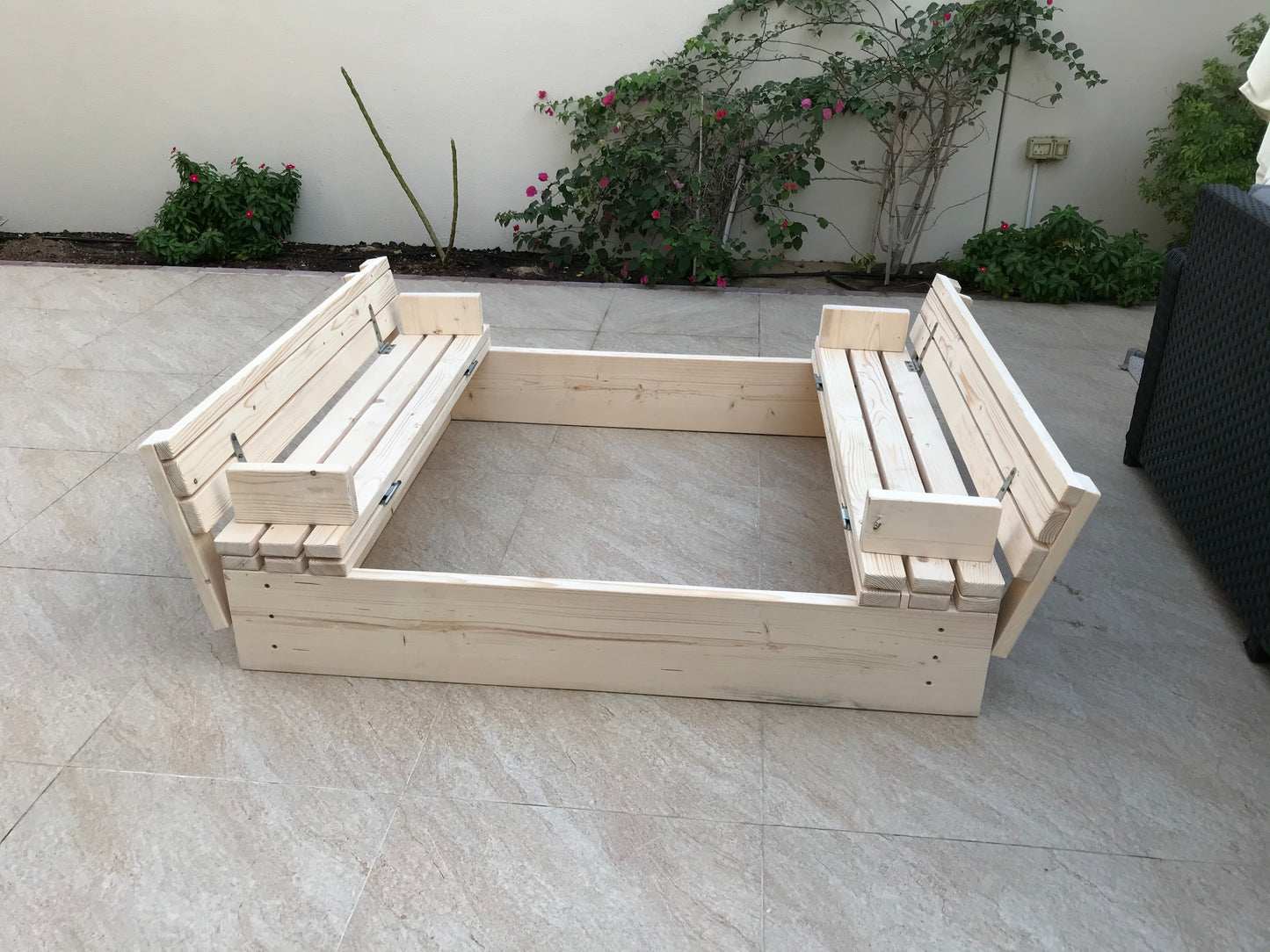 Wooden sand pit bench