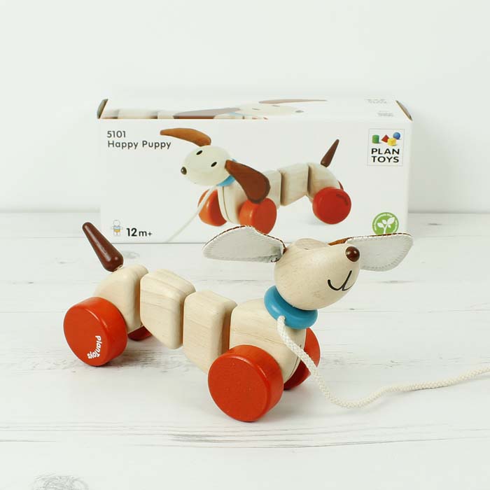 Wooden happy puppy pull along toy
