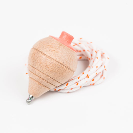 Beech wood spinning top - Coral